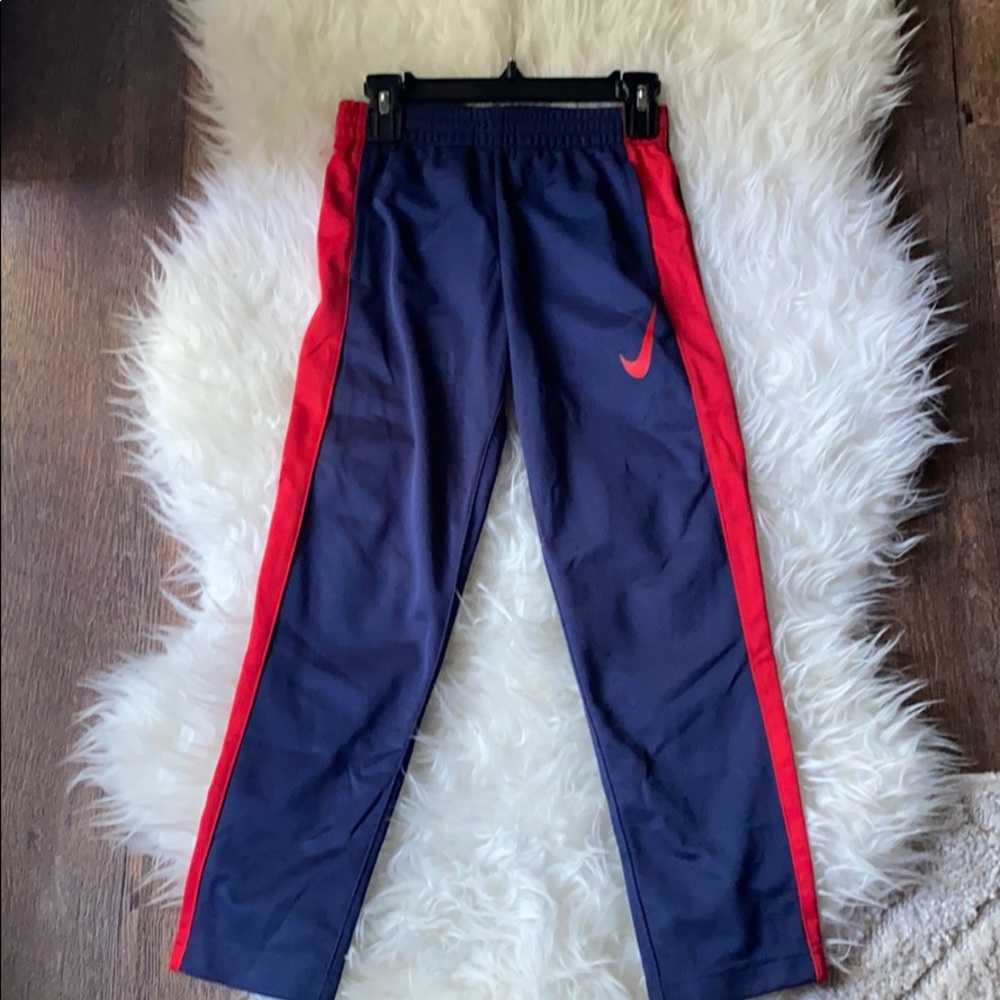Nike (kids ) (BOYS) sweat pants size 7 blue & red